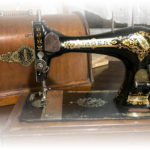 1897 Singer Hand Crank Sewing Machine with attachments